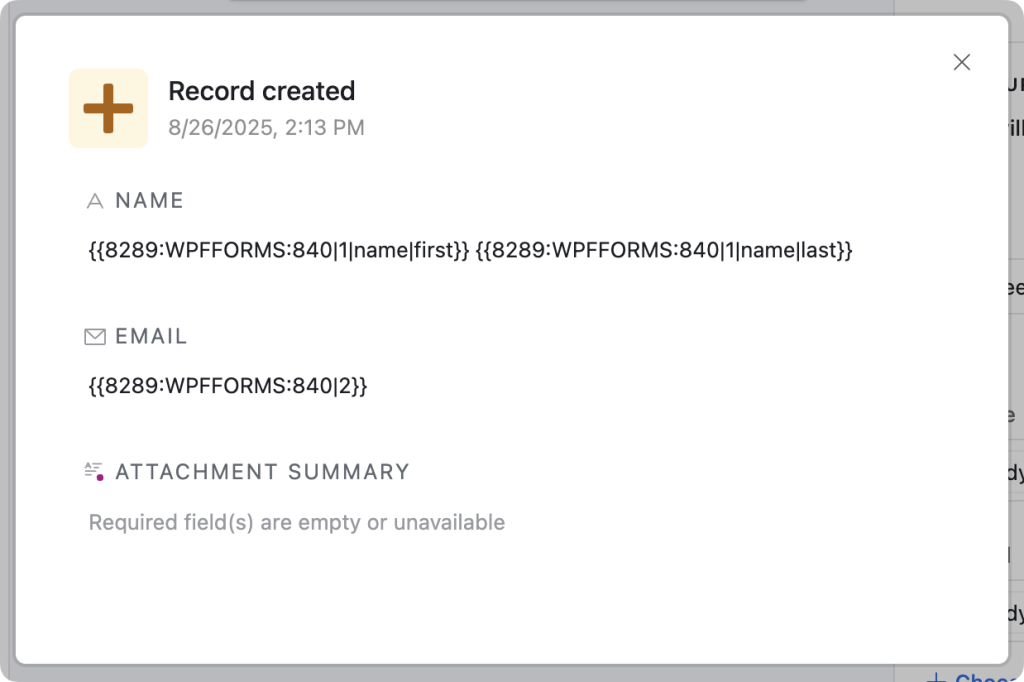 Airtable automation test result modal. The modal says “Record created” with a date and time stamp beneath it. The results show the successful entry of data from a webhook in the “Name” and “Email” fields.