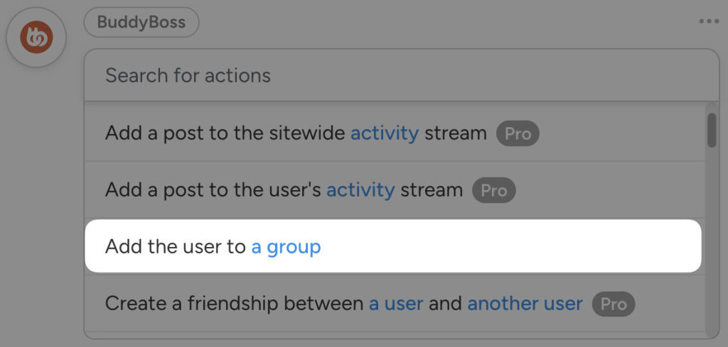 Uncanny Automator BuddyBoss action selection interface displaying a list of available actions. The highlighted action reads: "Add the user to a group." Other actions in the list include posting to the sitewide or user’s activity stream and creating a friendship between users, with some marked as Pro features.